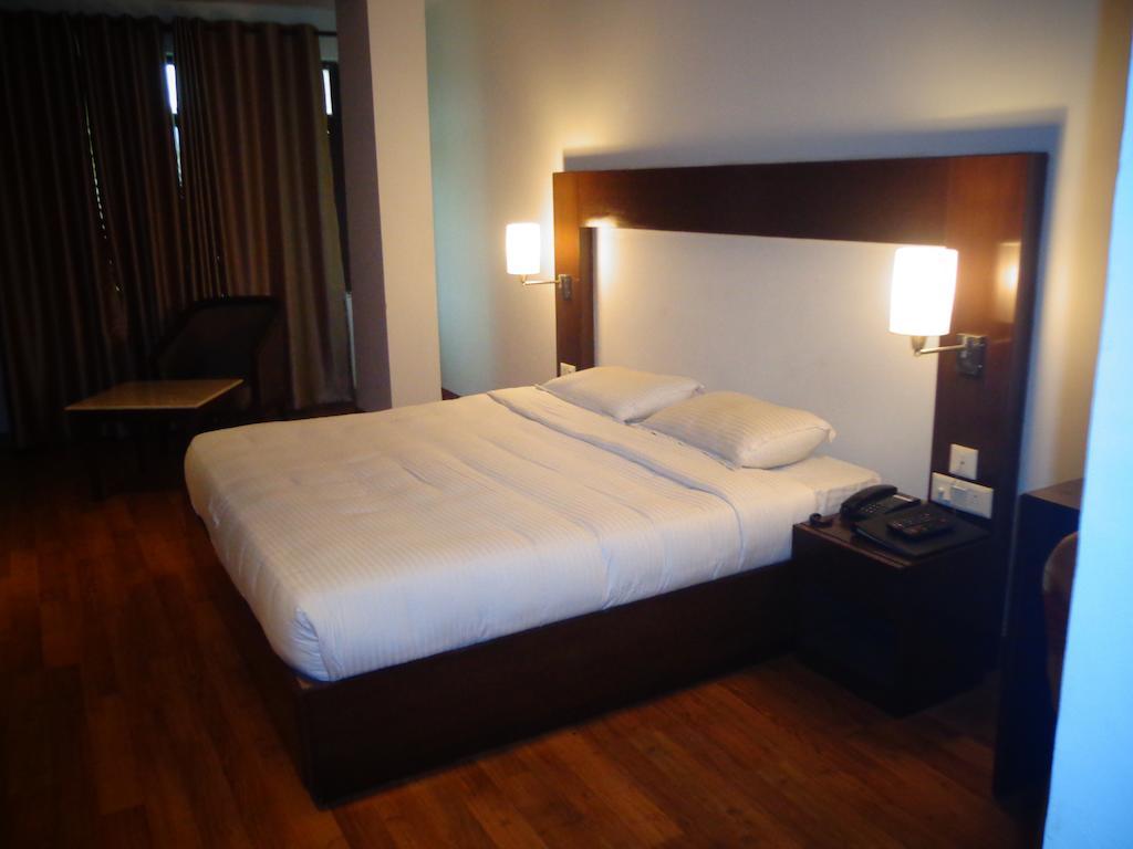 Hotel Golden Orchid Lucknow Oda fotoğraf