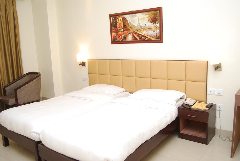 Hotel Golden Orchid Lucknow Oda fotoğraf