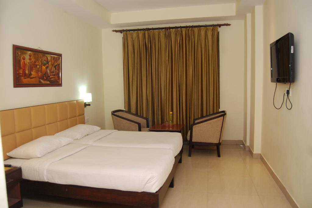 Hotel Golden Orchid Lucknow Oda fotoğraf